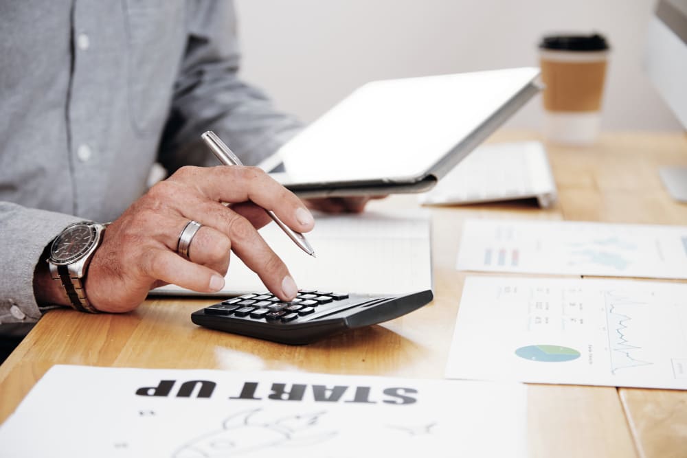 Man calculating business finance